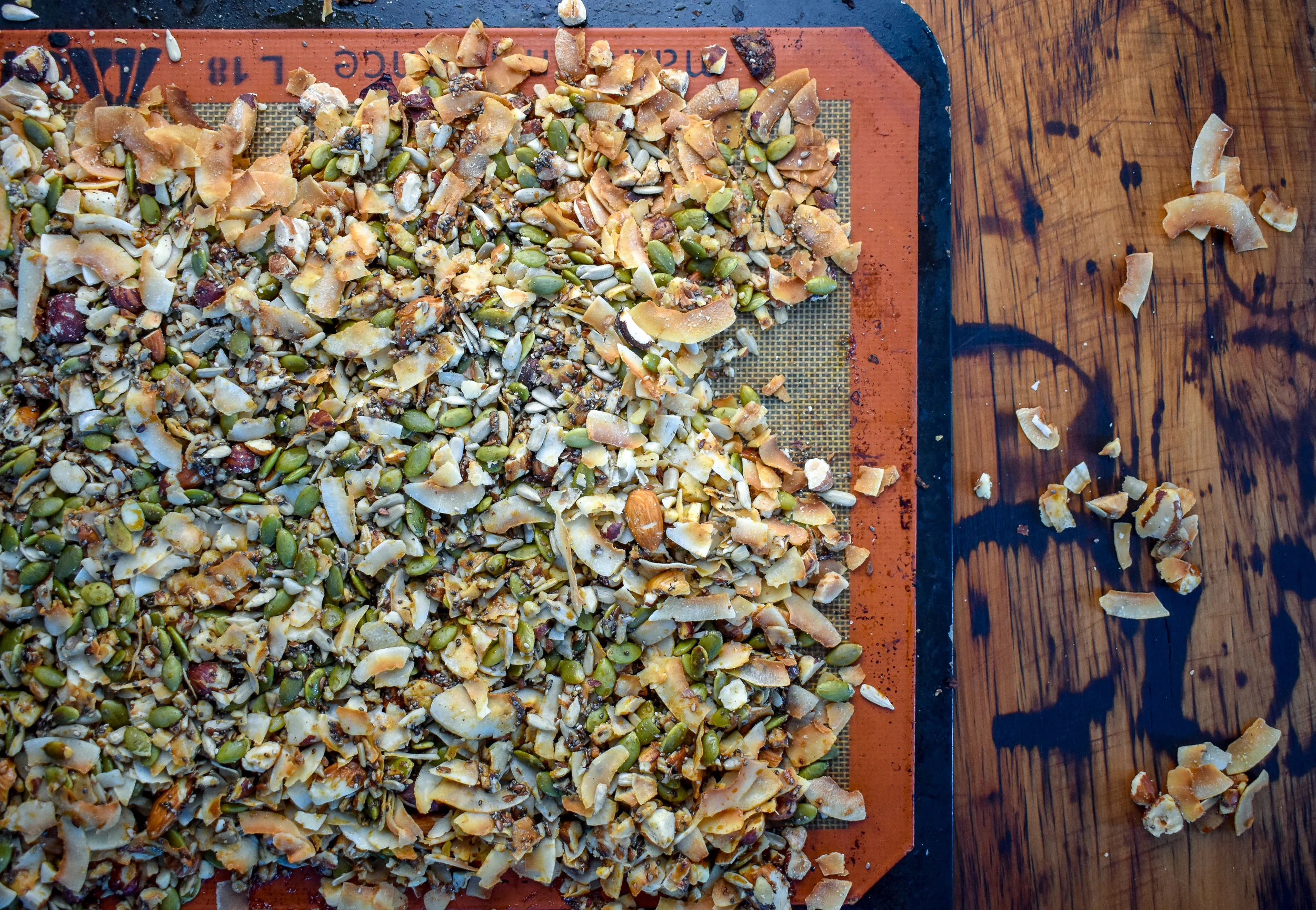 5. Spread the mixture evenly across silpat or parchment-lined baking sheet. Place into oven at 315F for 25 minutes.