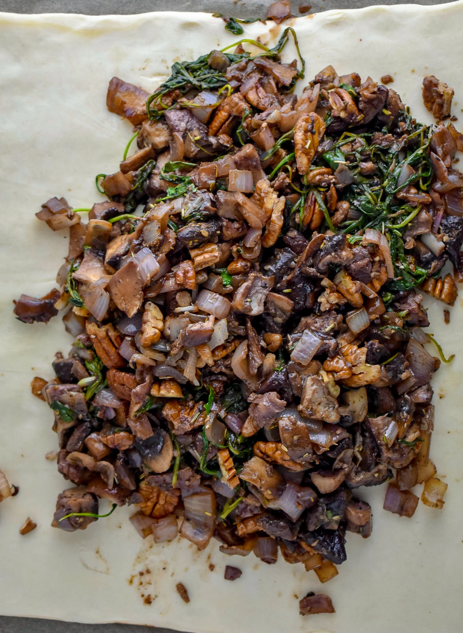 4. Roll the puff pastry. Dump the mushroom mixture onto the puff pastry.
