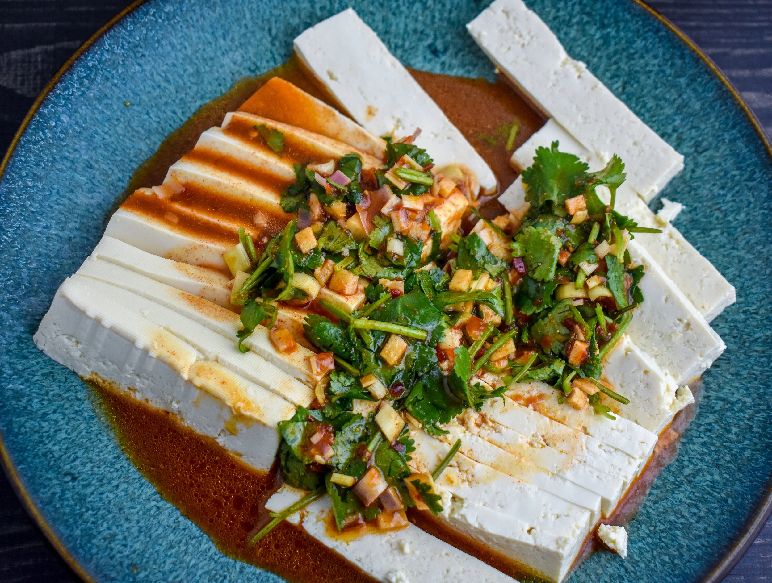 2. Next, mix the rest of the tofu ingredients in a small bowl. Pour the marinade onto the tofu and let it sit in it while you prep the other ingredients. Get a large frying pan warm on medium heat while the tofu marinates.
