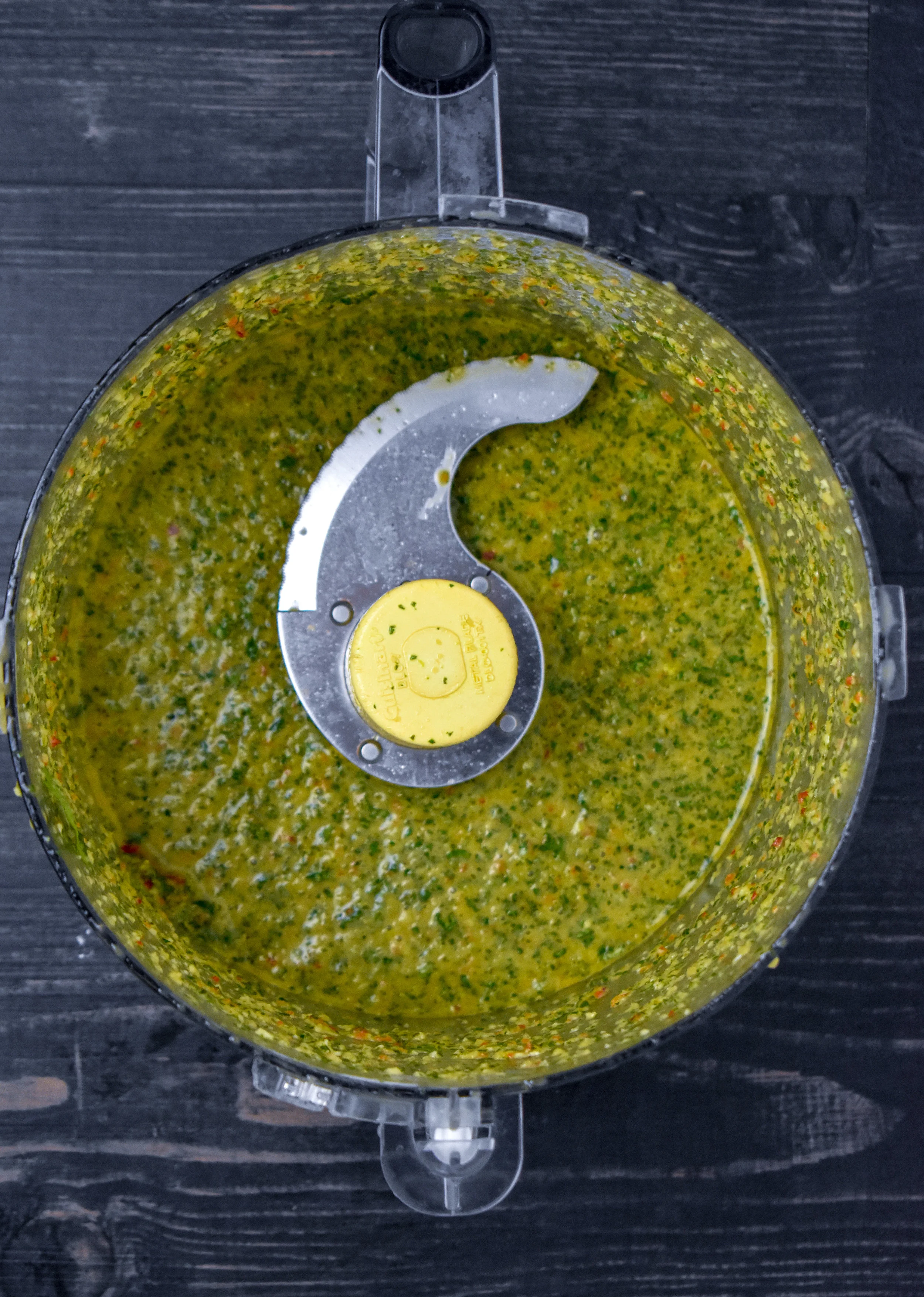 2. While the corn cooks, add all your chimichurri ingredients to a food processor or high-speed blender and mix for 15-20 seconds. Scrape down the sides and repeat.