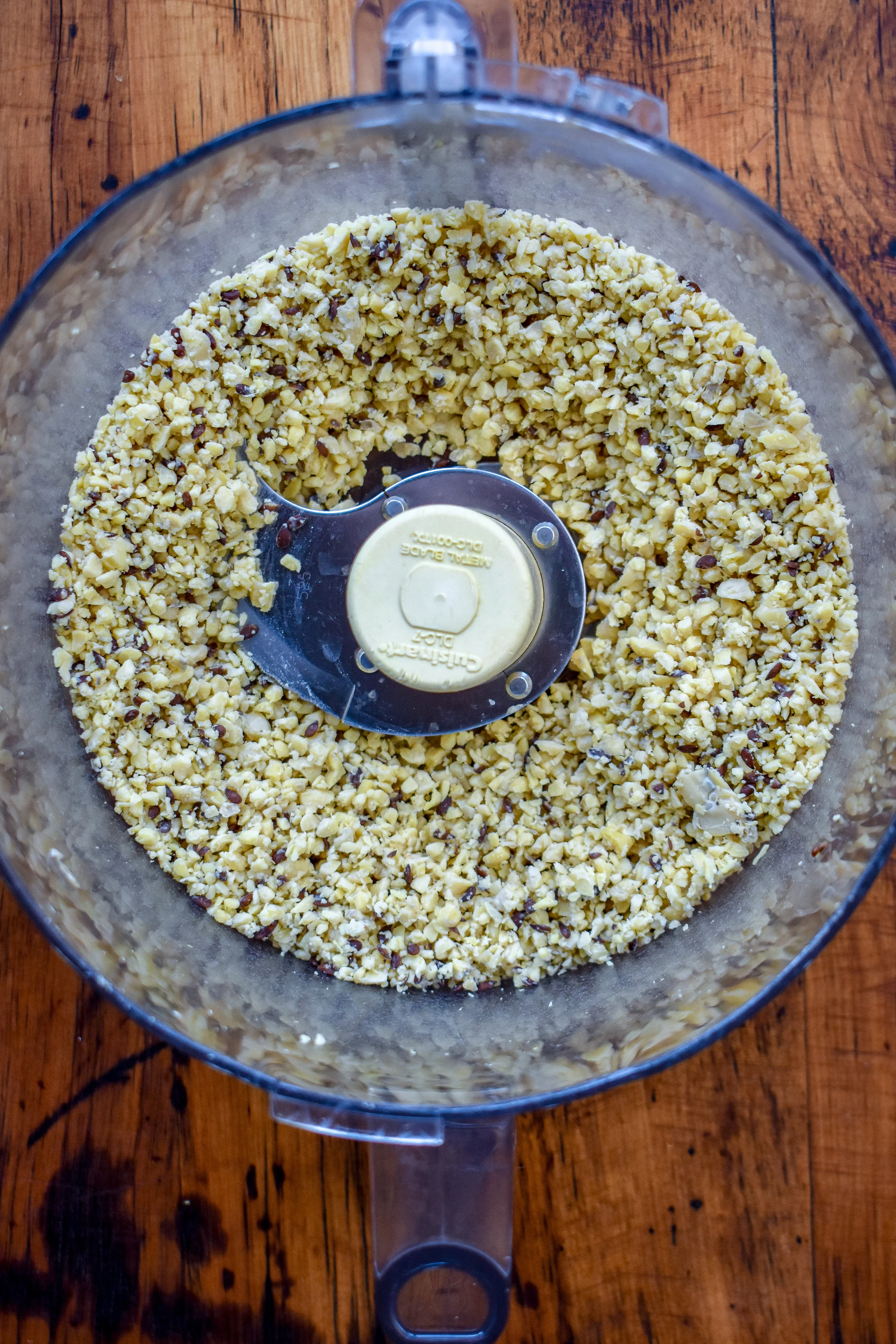 1. To start, place tempeh into food processor and blend until crumbly. Don't overdo it.
