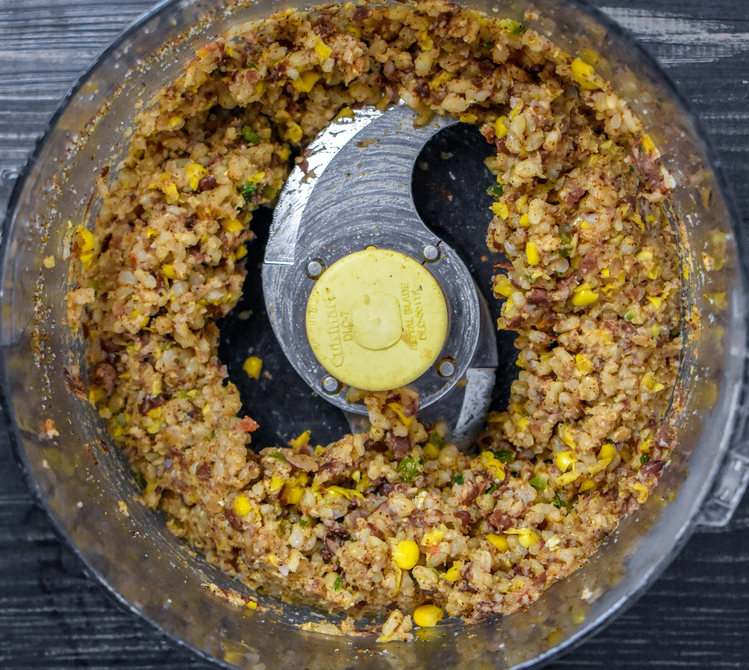 4. Take 1/2 the mixture and place into food processor and mix well until great blend. Add with 1/2 that is unmixed and blend with fork to break apart and mix it well. If too wet and sticking a lot to hands, add in more breadcrumbs. If too dry add in more salsa.