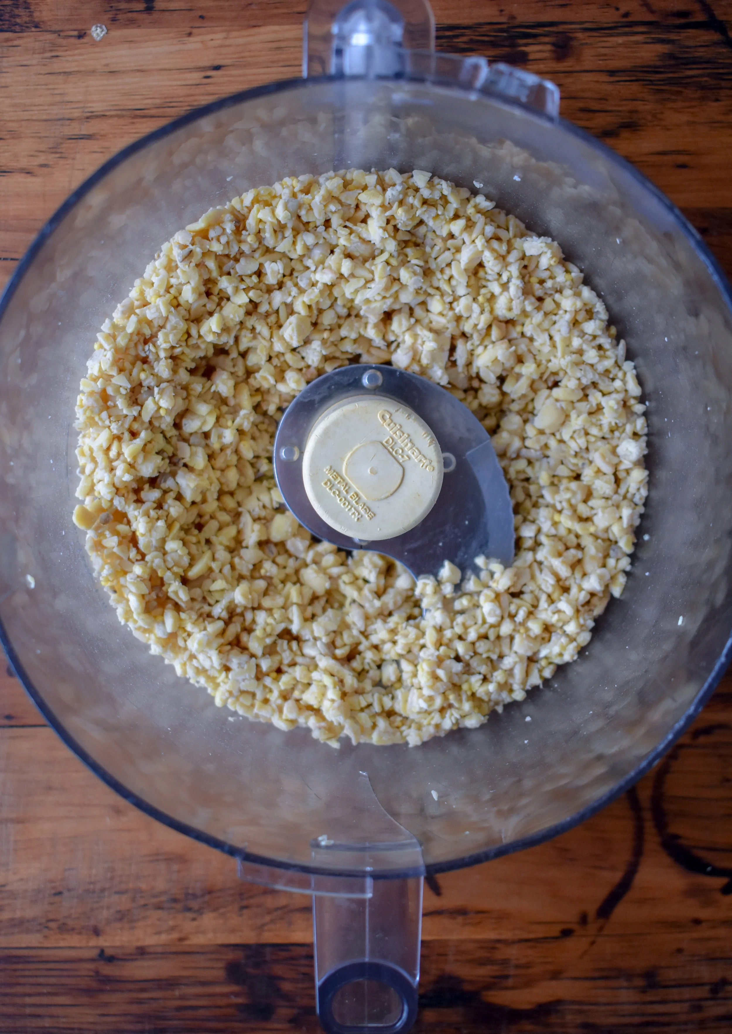 1. While the lentils cook, add tempeh to food processor and blend until tempeh becomes like oversized rice granules. 
