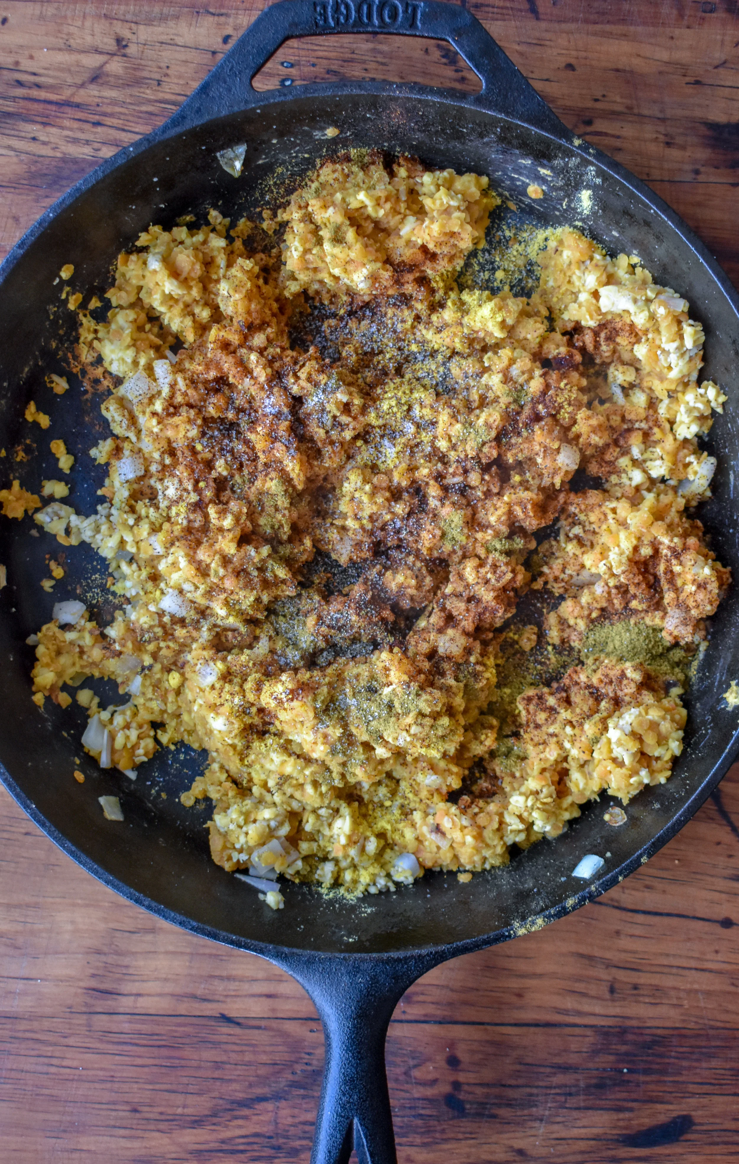 3. If onions + garlic finish before lentils, take them off heat. Once lentils are done, add lentils, blended tempeh and all the spices for sloppy joes to the pan. Mix well and cook for 2-3 minutes over medium heat, stirring frequently.