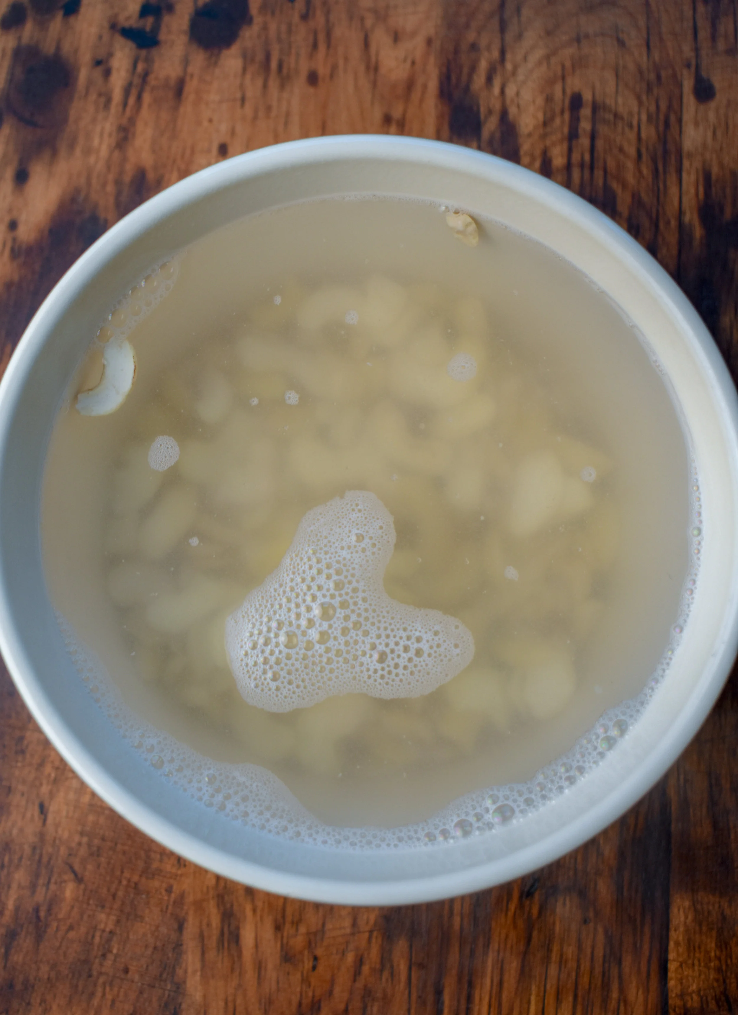 1. Start by bringing 2 cups of water to a boil. Pour on cashews and soak in a bowl for 30 minutes.