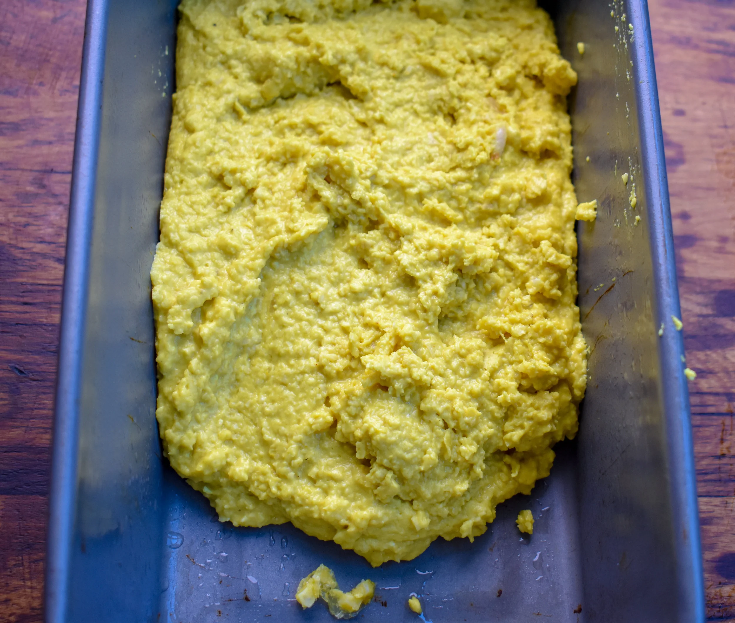 4. Add the cheese mixture to a loaf pan. Spread evenly. Place in freezer for 30 minutes, then refrigewrate for another 90 minutes so its completely set.