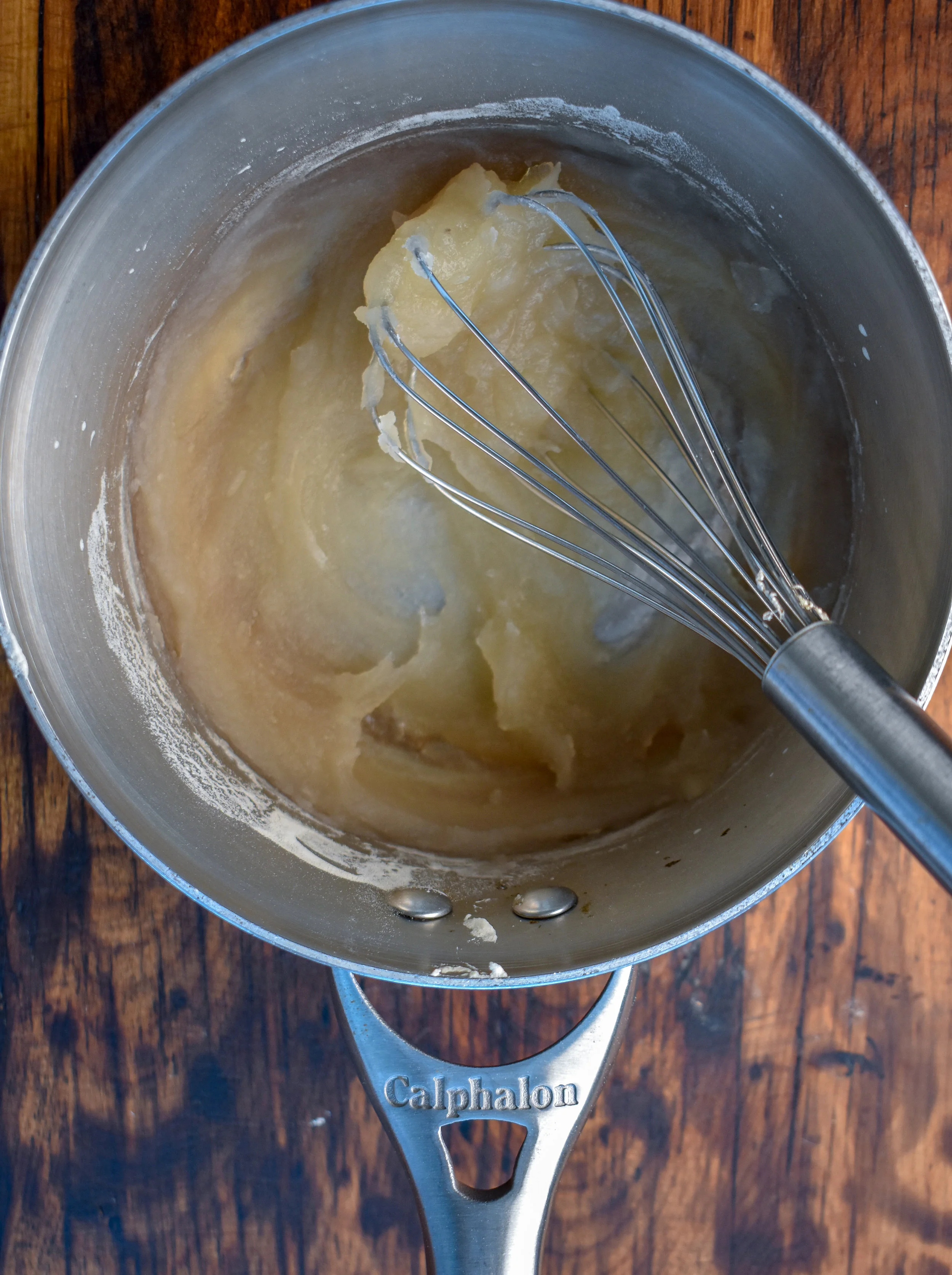 2. Once the cashews are done, mix agar agar powder with water and bring to boil. Whisk until agar agar powder is well mixed. Immediately (while still wet) transfer to a food processor.