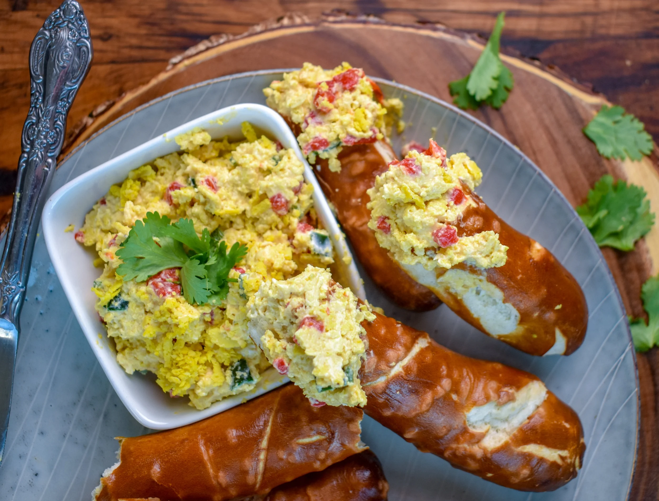 7. To serve, gently fold in the grated cheese to the other mixture. I use a spatula and am very delicate so the cheese doesn't break down too dramatically! Serve with your favorite dipper!