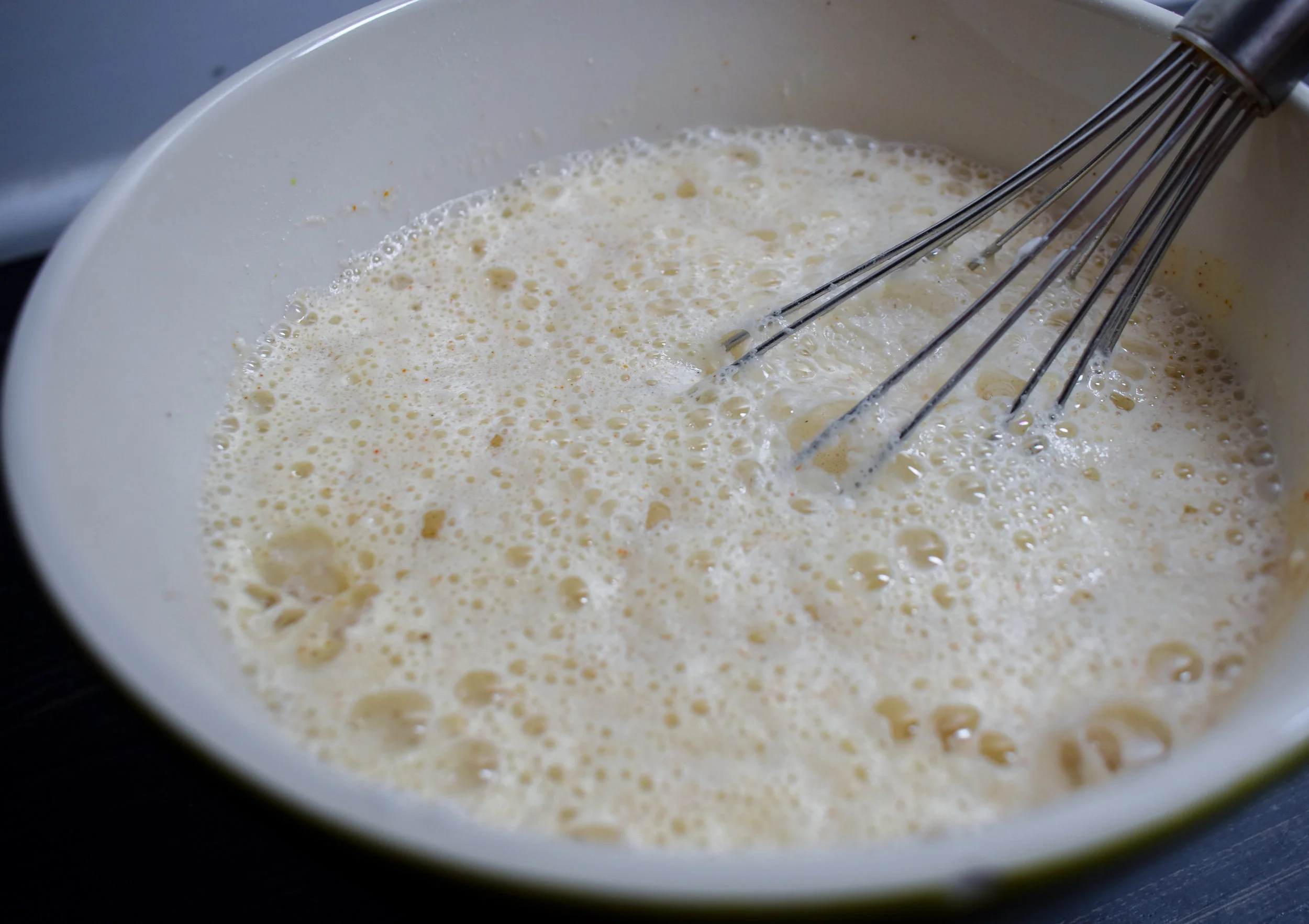2. While the tofu is draining, mix the flour, baking powder, sand salt for the fillet. While whisking pour in the beer until well mixed. It'll be bubbly and thin. Cover and place in fridge for fifteen minutes. The batter firms up s