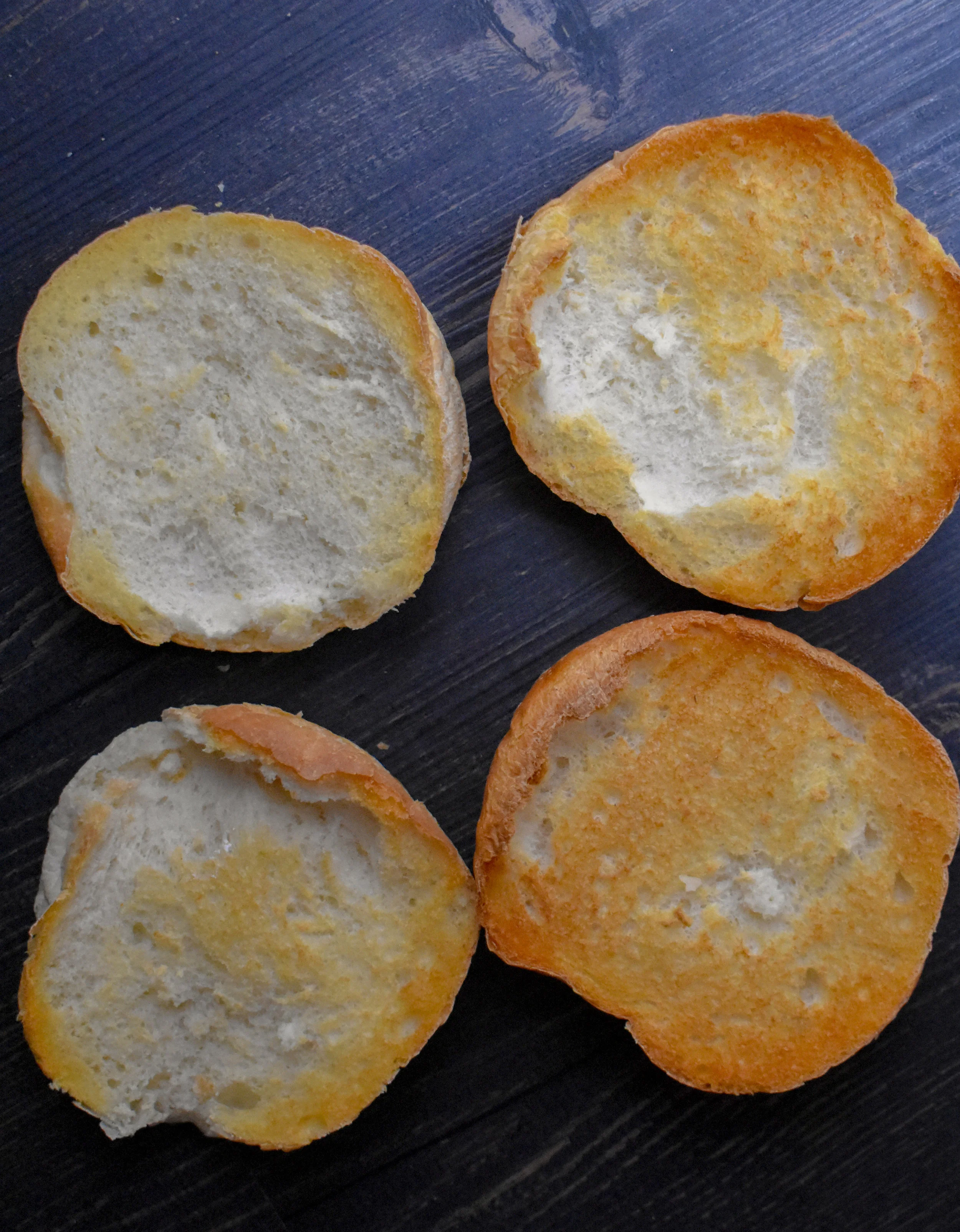 8. While the fish fillets cook, place your buns (halved) into oven on Broil 525F for 7 minutes (until golden brown). I don't preheat the oven.