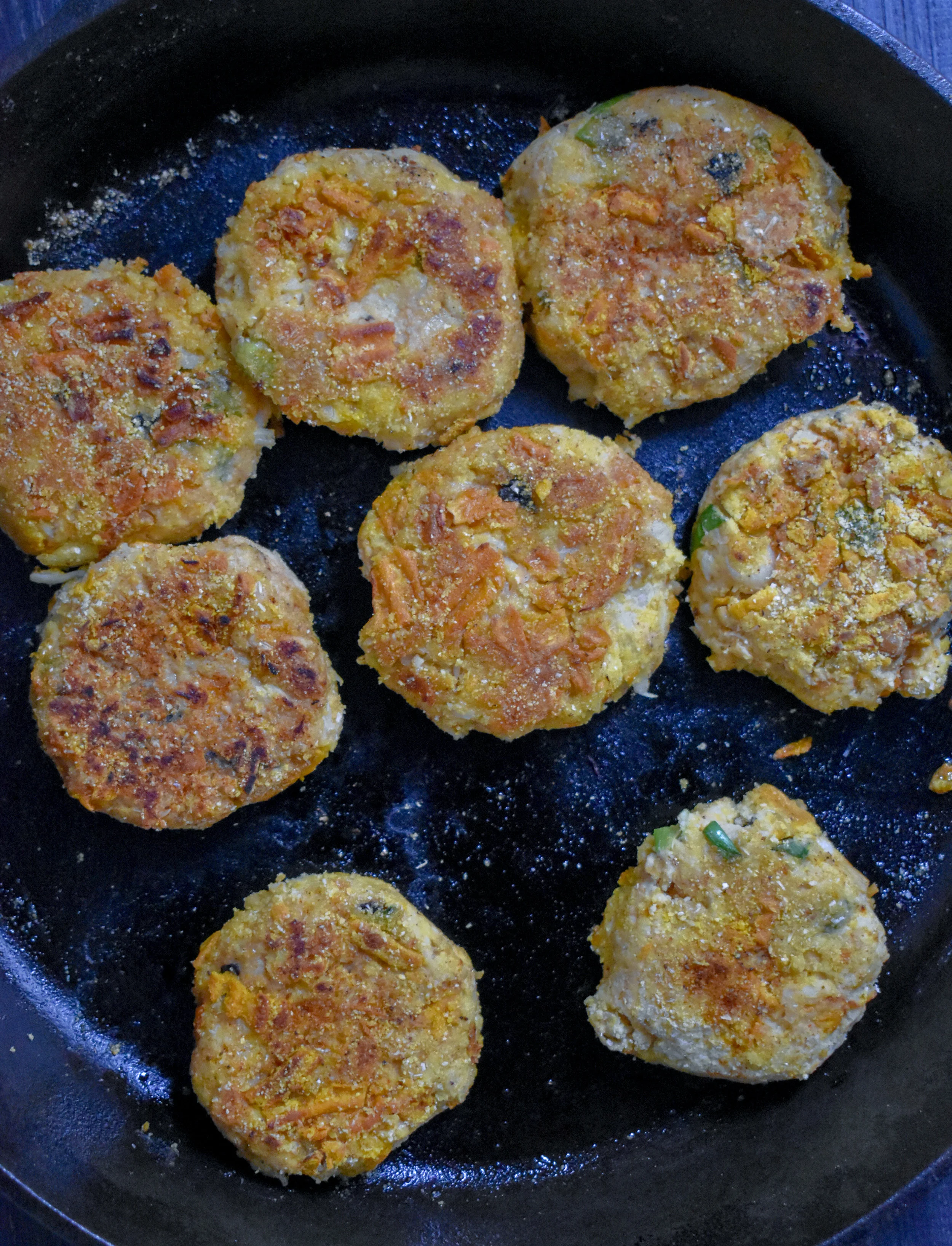 6. Add 2 tbl of walnut or other oil to a large castiron pan and heat over medium heat for about 2 minutes. Once hot, add patties and cook for 4 minutes on each side until golden brown.
