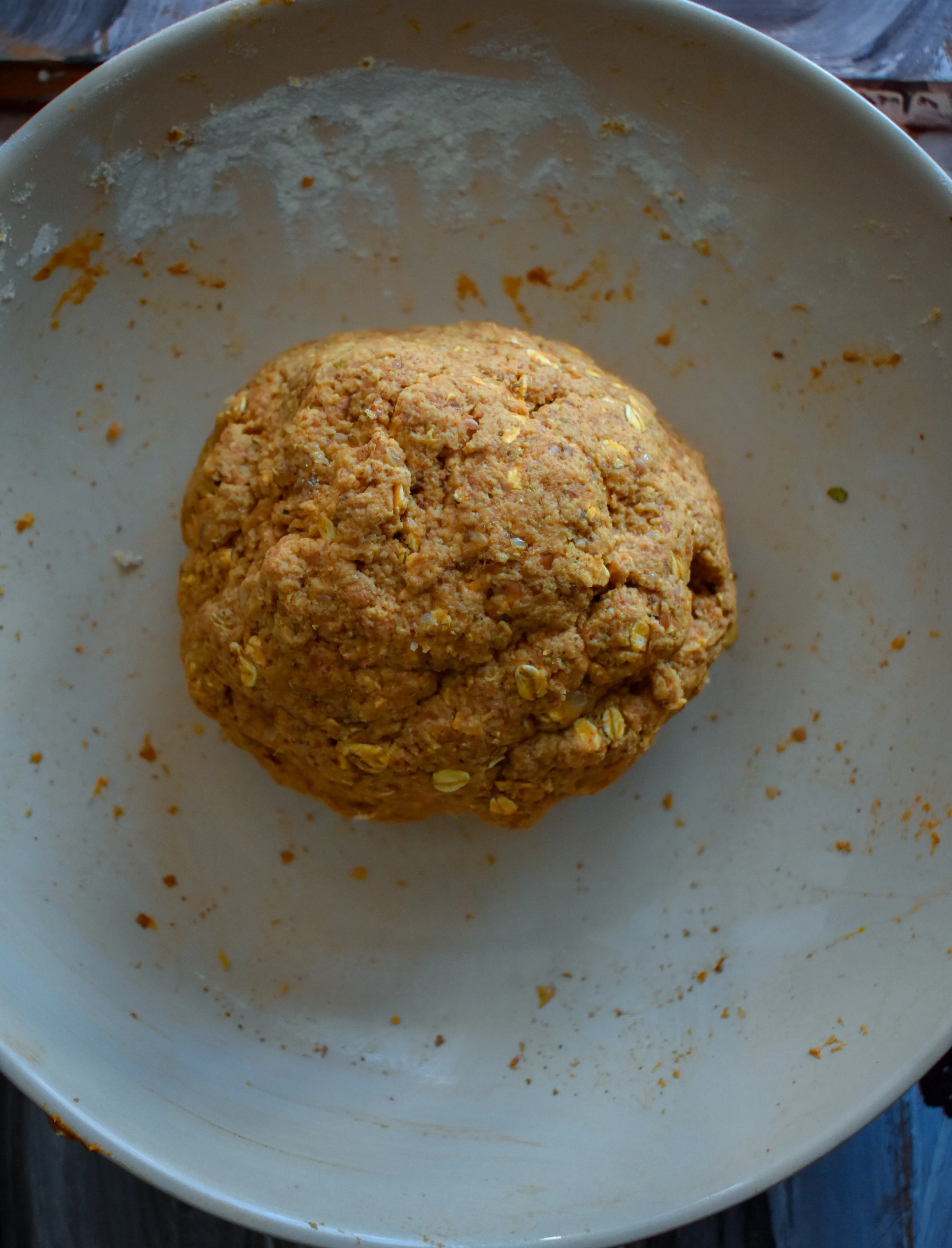 6. Take the mixture and begin to knead in your bowl for 3-4 minutes until begins to toughen. Make a large ball.