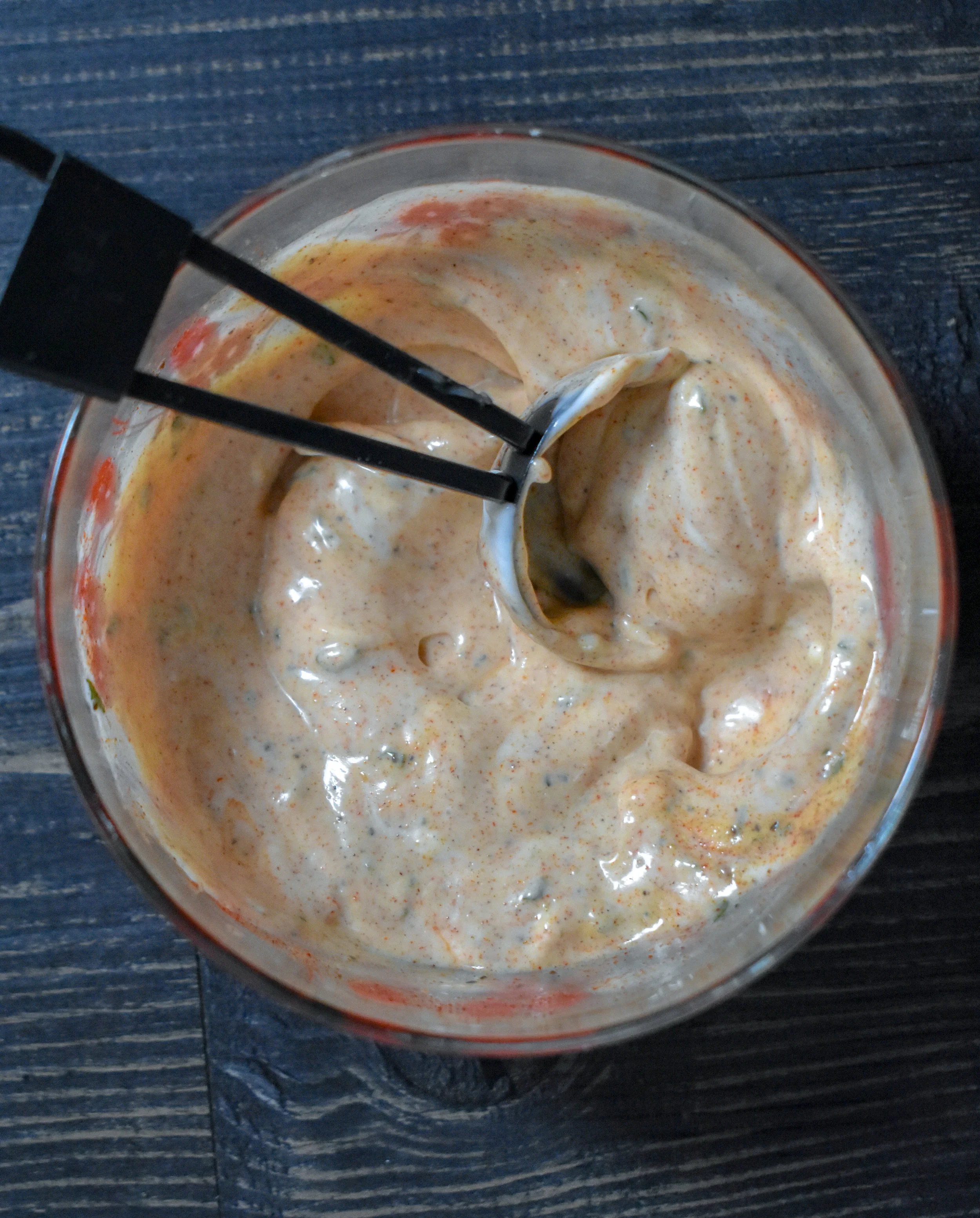 4. Next, while the jackfruit continues to cook, whisk together the aioli. Use a pinch of each spice from the jackfruit but leave out the cayenne unless you like your food HOT HOT HOT. Whisk until smooth and set aside/refrigerate until ready.