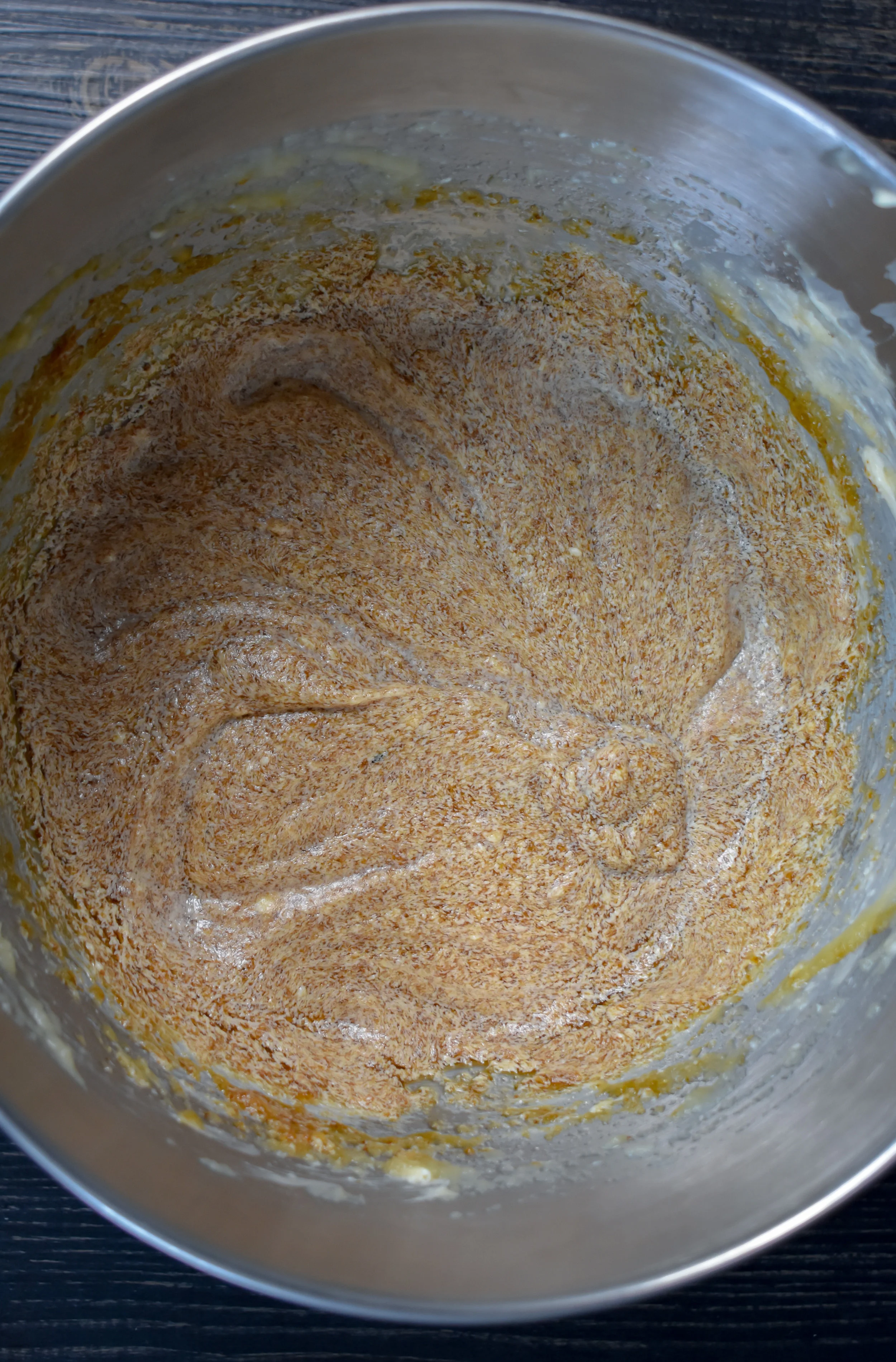 1. To start, add sugar, butter, and applesauce to a mixing bowl. Use a stand mixer or hand mixer to cream for about 2 minutes on low setting.