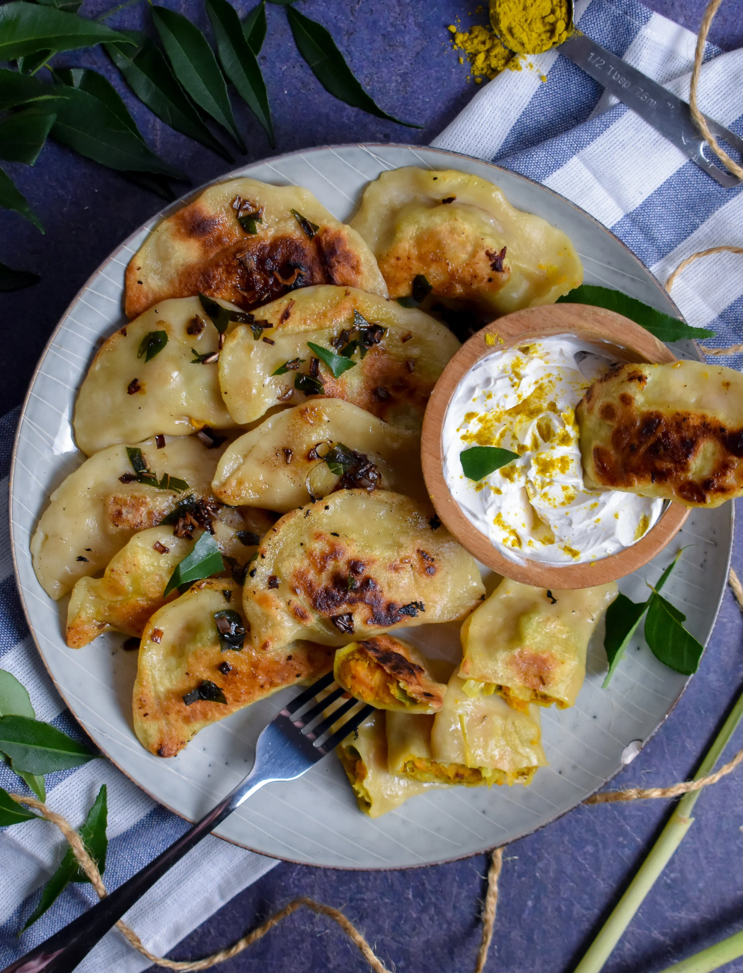 Vegan Curried Sweet Potato, Snow Pea, and Caramelized Leeks Pierogies w/ Lemongrass Brown Butter