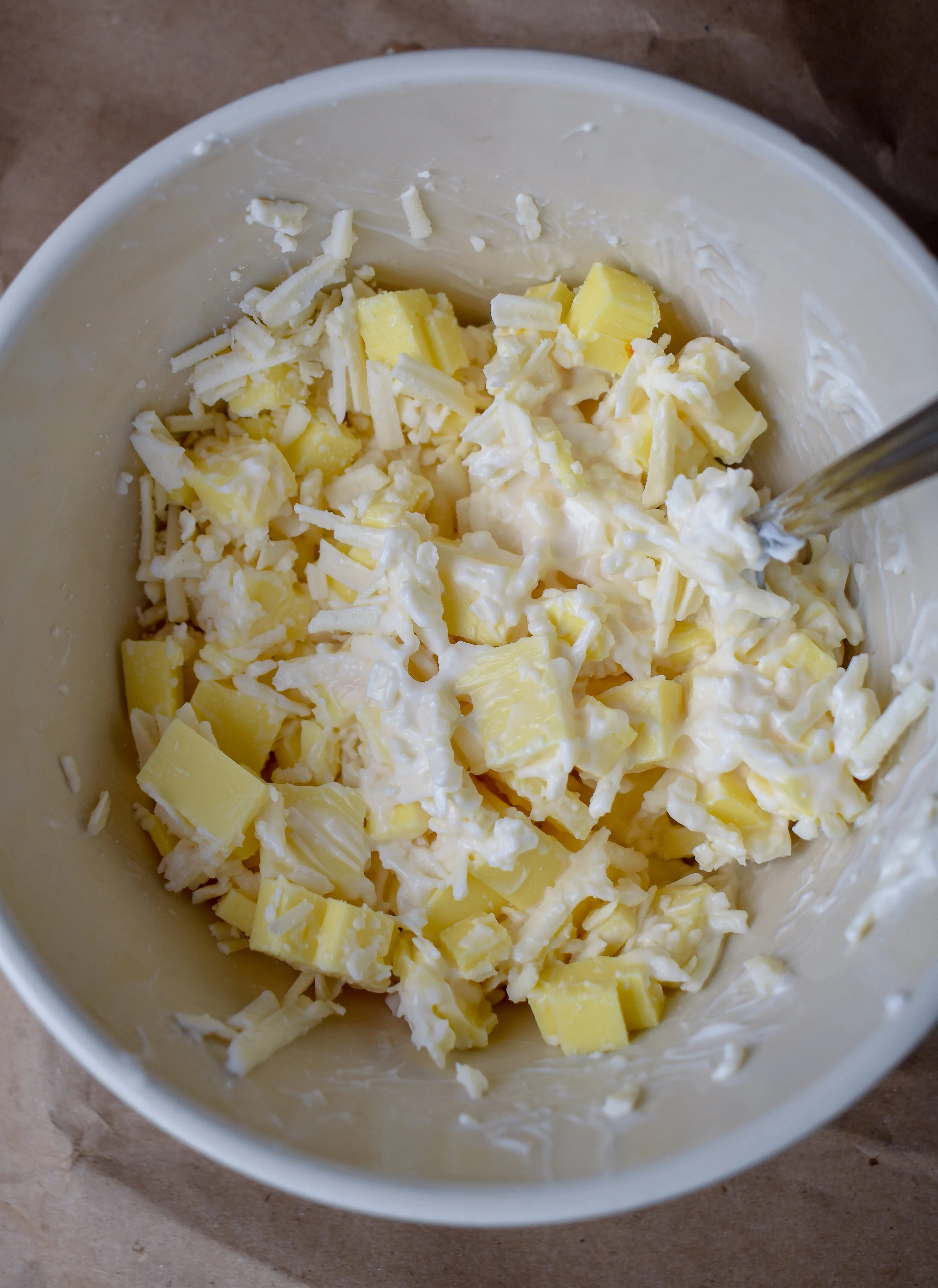 5. Next, mix together the cheeses + mayo for the cheese layer. Set aside.