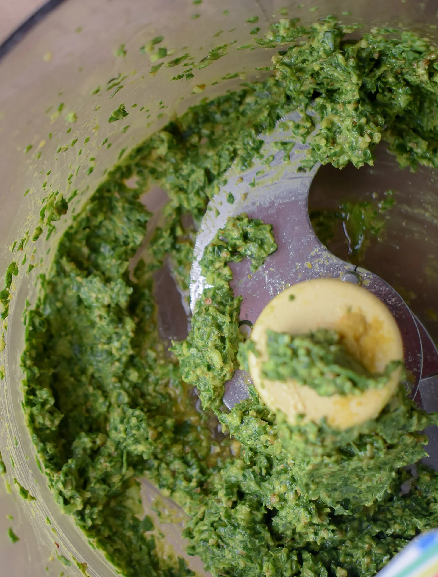 6. Next, add all the ingredients for the pesto to a food processor or blender and process/blend for 15 seconds. Scrape down sides and repeat. Set aside.