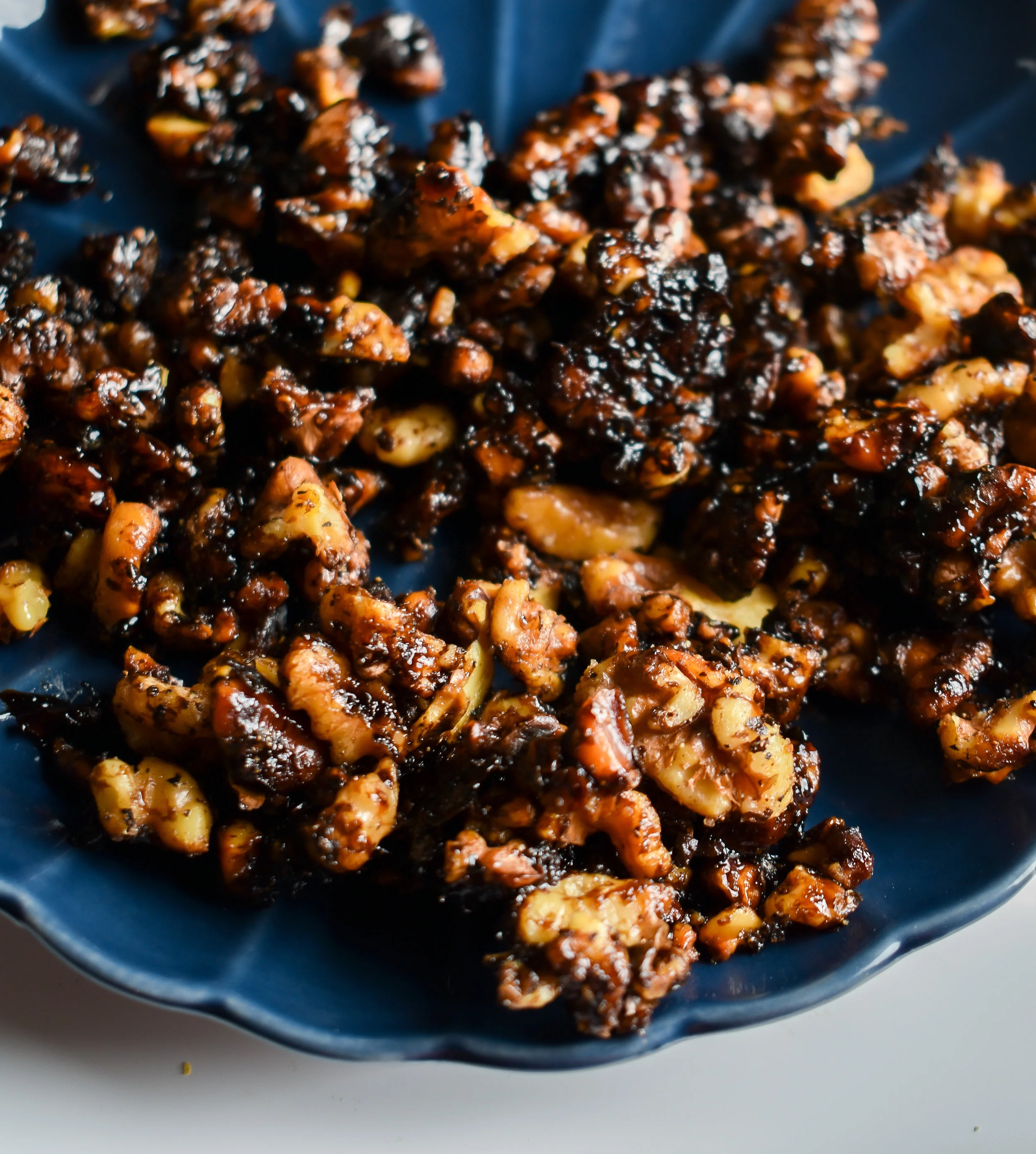 3. While the beets roast and pear cook, dice up the walnut and add to a dry medium pan. Toast for 6-8 minutes over medium low heat until it starts to become fragrant. Add butter and cook another 2-3 minutes then add balsamic glaze and salt and pepper. Take off heat and let sit. Set aside.