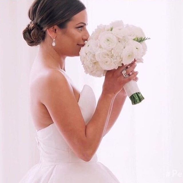 Beautiful image of @leamichele of the holding the bouquet we created for her wedding. So grateful to work along side such an amazing creative team on this wedding. @lisavorce @ktmerry @carnerosresort @moniquelhuillier