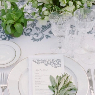 Tabletop details for this beautiful wedding @carnerosresort. These linens, imported from Italy, have a beautiful hand blocked pattern that was was used as inspiration on the menu. A matching blue twine was used to tie the herb sachets at each guest&r