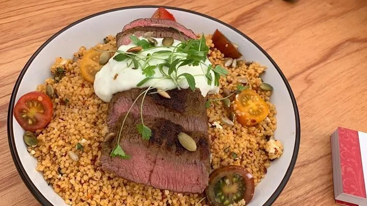 Plated up - easy BBQ Moroccan lamb with Tzatziki and couscous.