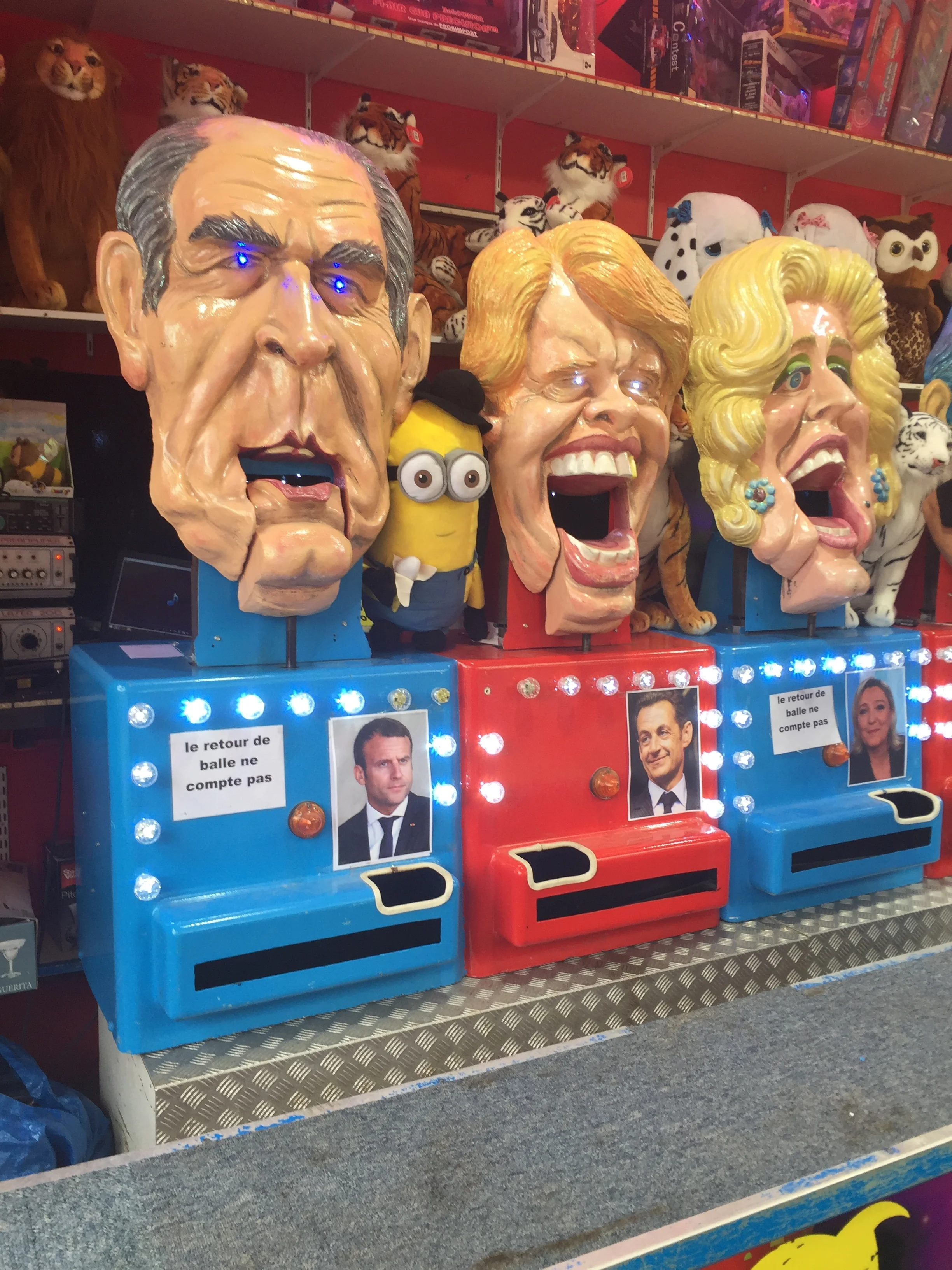 Kid-friendly carnival game encourages children to throw ball at politicians’ heads :)