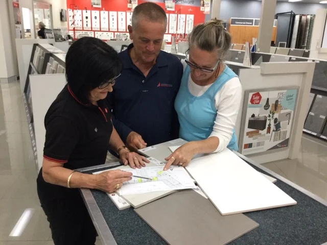 Clients, Anna and Joost, being guided through their selections experience at Beaumont Tiles.