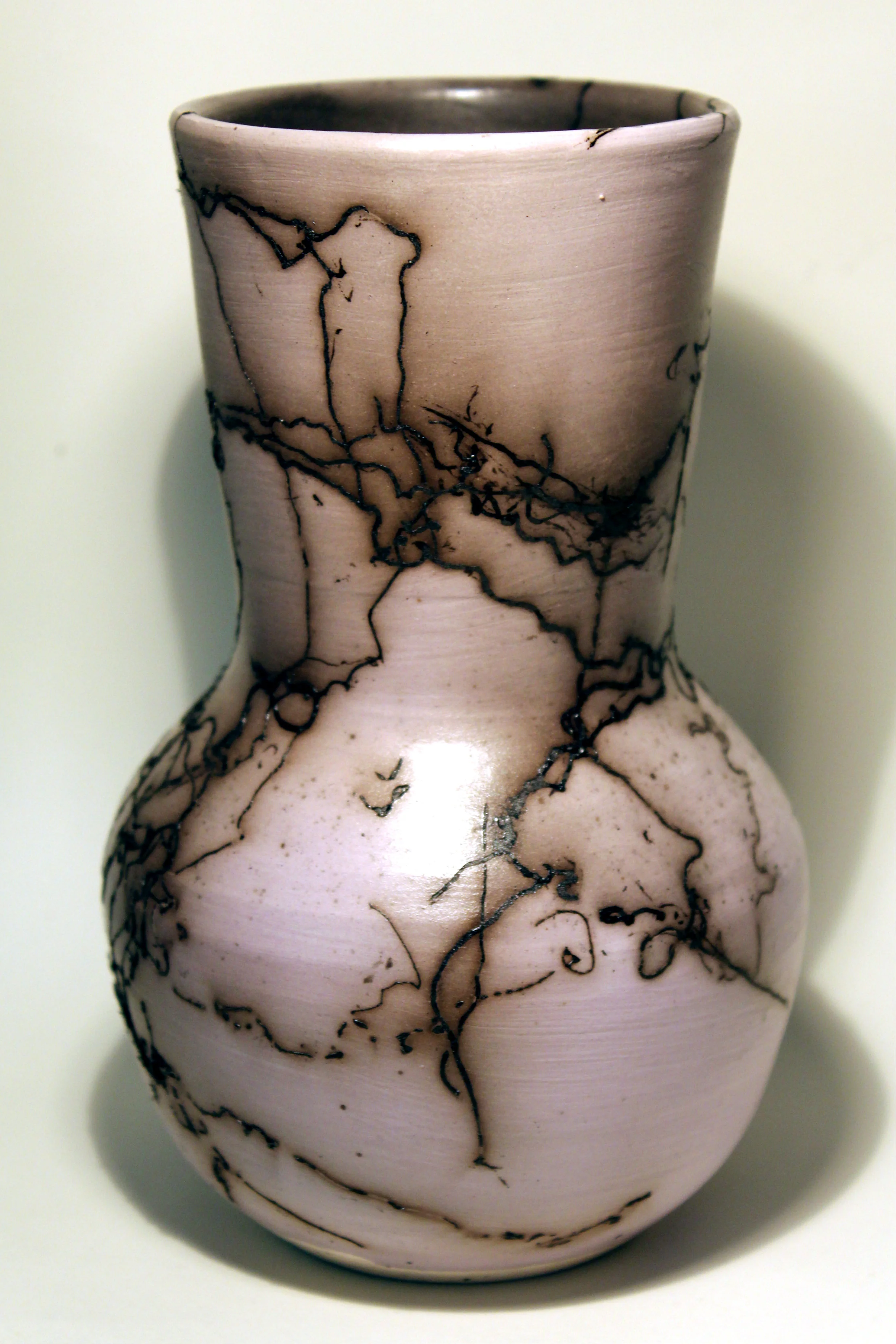 Porcelain, raku fired, 4 x 7 inches, 2017