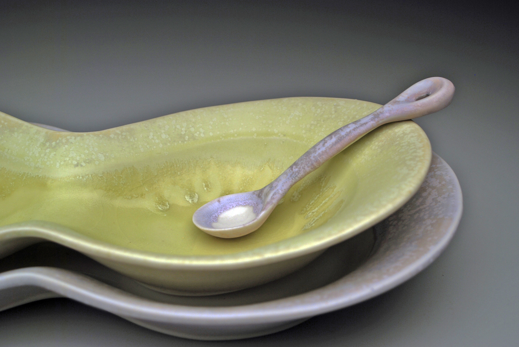 The softness of a bowl, or plowl, in welcoming a spoon.