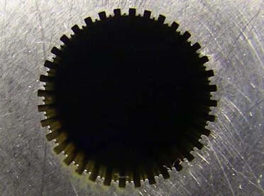 Extrusion die to make low friction catheter tubing