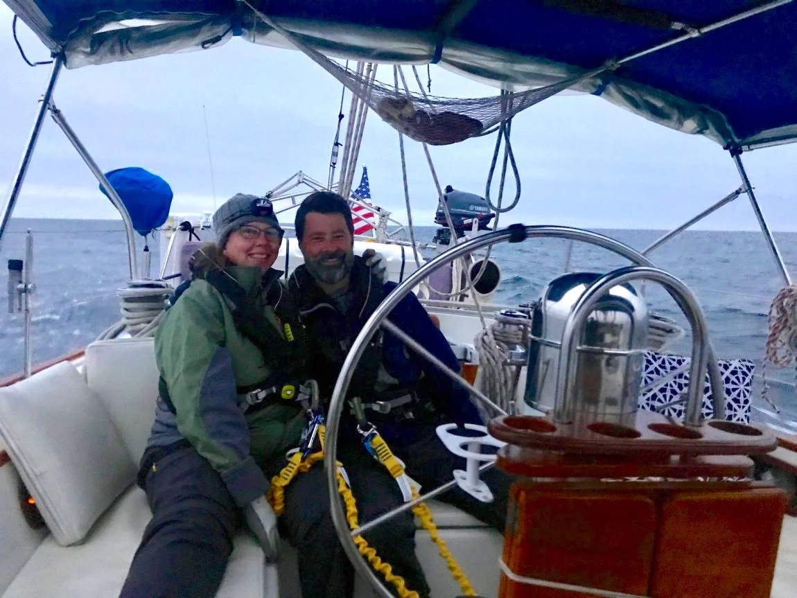 Our friends Eric and Chandra ready for their first night passage.