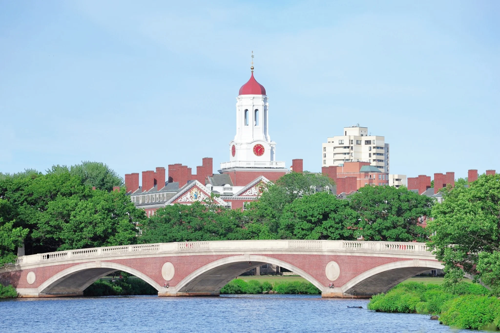 John-W.-Weeks-Bridge-and-clock-tower-over-Charles-River-in-Harvard-University-campus-in-Boston.jpg
