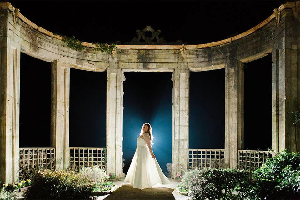 I just wanted to say thank you so much for all your hard work in creating my dream wedding dress. It was completely perfect and I felt like a princess for the whole of our wedding day. I really didn't want to take it off; even at 2 o'clock in the morning when all the dancing had finished and most of the guests were in bed, I still wanted to float around the house in my beautiful gown! I will treasure every memory I have in it and will certainly be keeping it as a family air loom! From the very early stages of choosing the "Esthea" (I love that you name the brides gown after her!), I just knew she was the one! Until finding the boutique I had struggled to find the perfect gown; being a curvy lady, it was so important for me to feel myself and be proud of my curves. I had complete faith in you both knowing what suited my body shape and ensuring I felt beautiful. Thank you so much for that. You both are truly talented and amazing! Photo By: Art By Design Wales