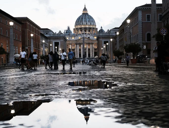 St_Peters_Basilica_plus_reflection_after_rain_Aug_31_2018_by_Spencer_Platt_Getty_Images.jpg