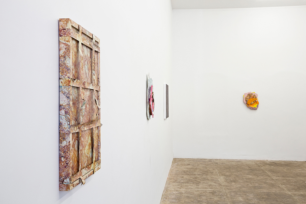   Skinned , 2015 24 x 16 x 2 inches Hydroprinted artist's frame and tarp  Installation view: "Analog Watch" at CES Gallery, Los Angeles CA 