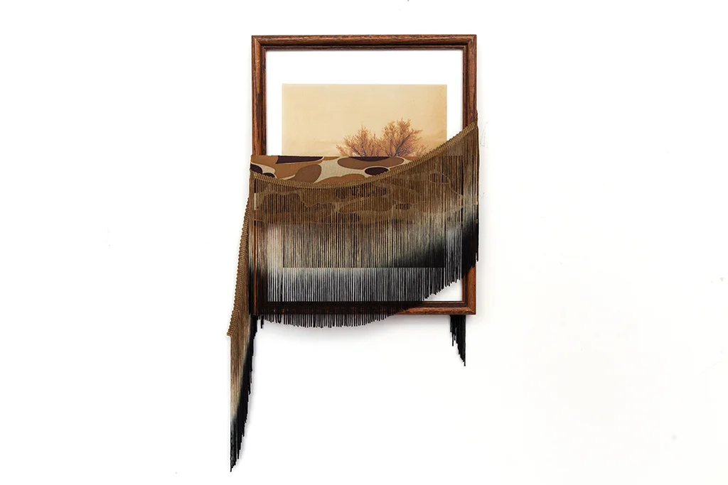  A Pretender of Dead Leaves, 2015 Found frame and print, neoprene, fringe 15 x 8 inches 