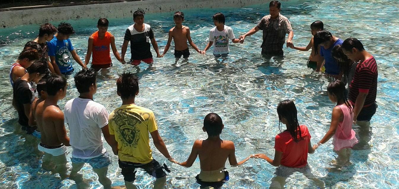 baptism at a neighboring pool