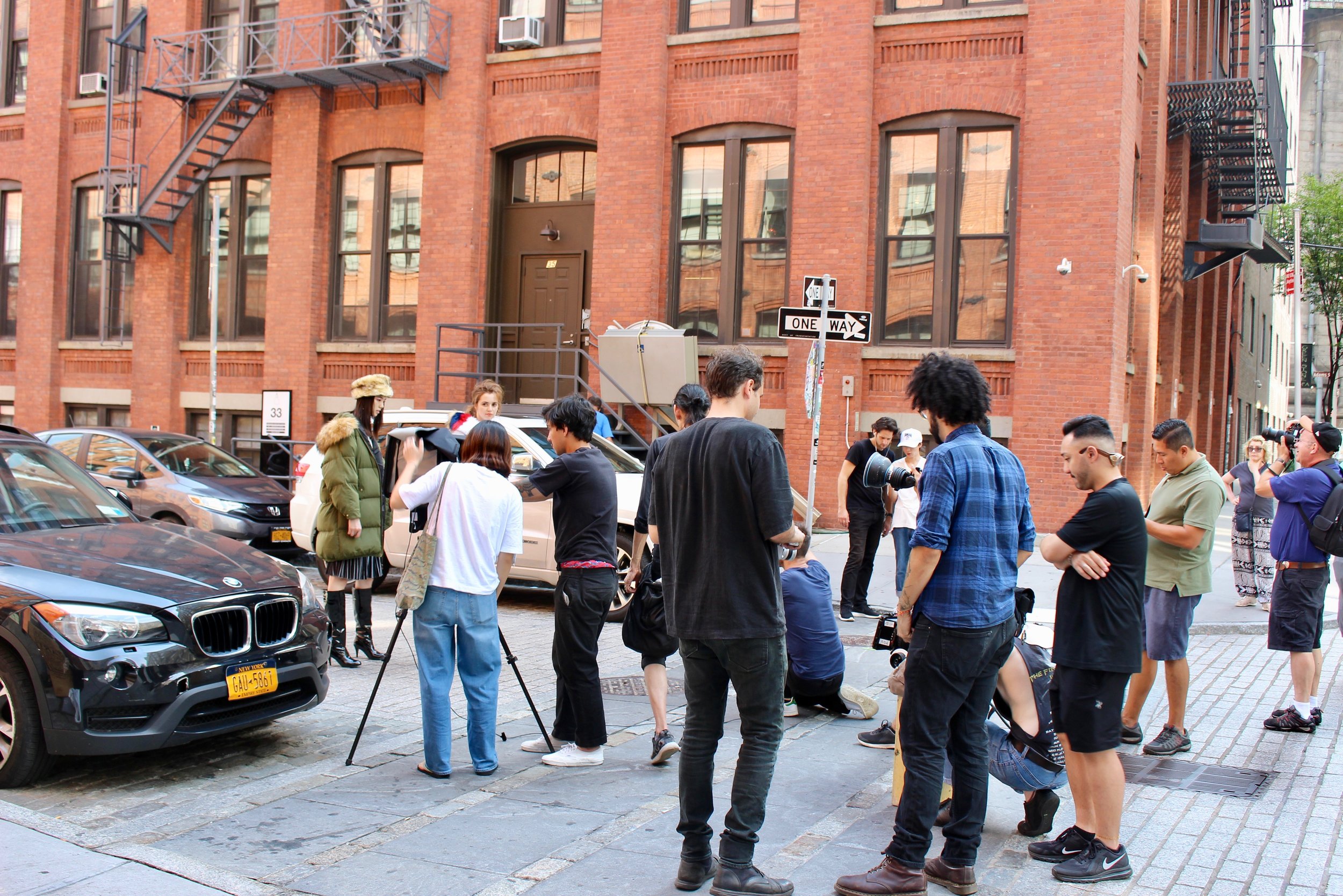  Typical every-day DUMBO pandemonium.&nbsp; This scene is very common on Washington Street at the corner of Water and Washington.&nbsp; It is a fashion photo shoot.&nbsp; Photographers are facing west towards an iconic DUMBO view.&nbsp; See the next 