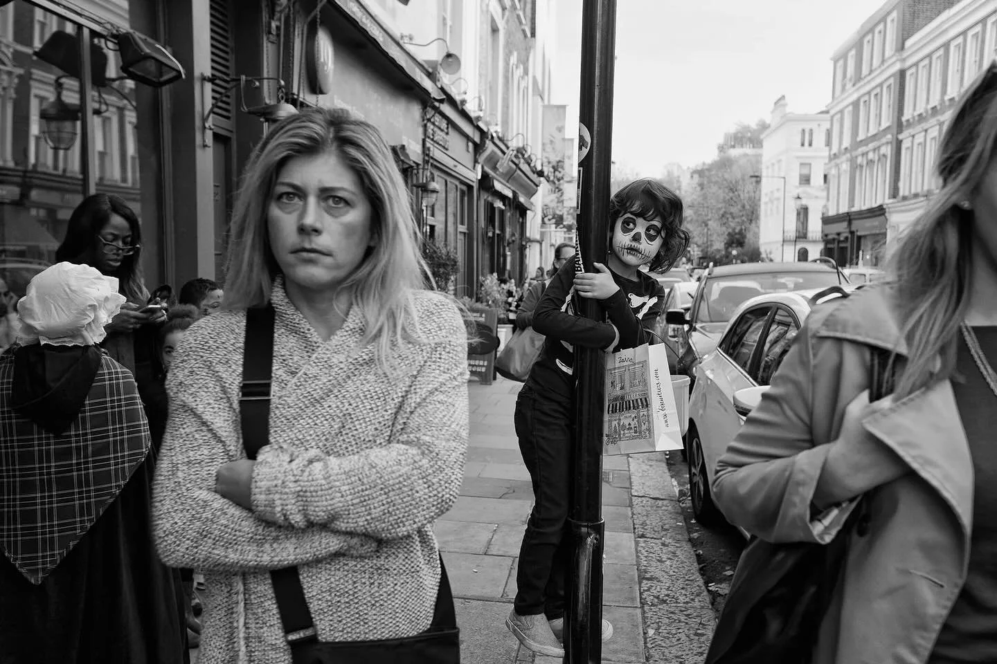 For All Saints&rsquo; Day, a classic image from my project W10 London 🖤. A kid in a Halloween costume 🎃 climbing a pole in Notting. A short diversion from my usual colour street work. 
👉 See the full project on my website: lorenzogrifphoto.com/w10