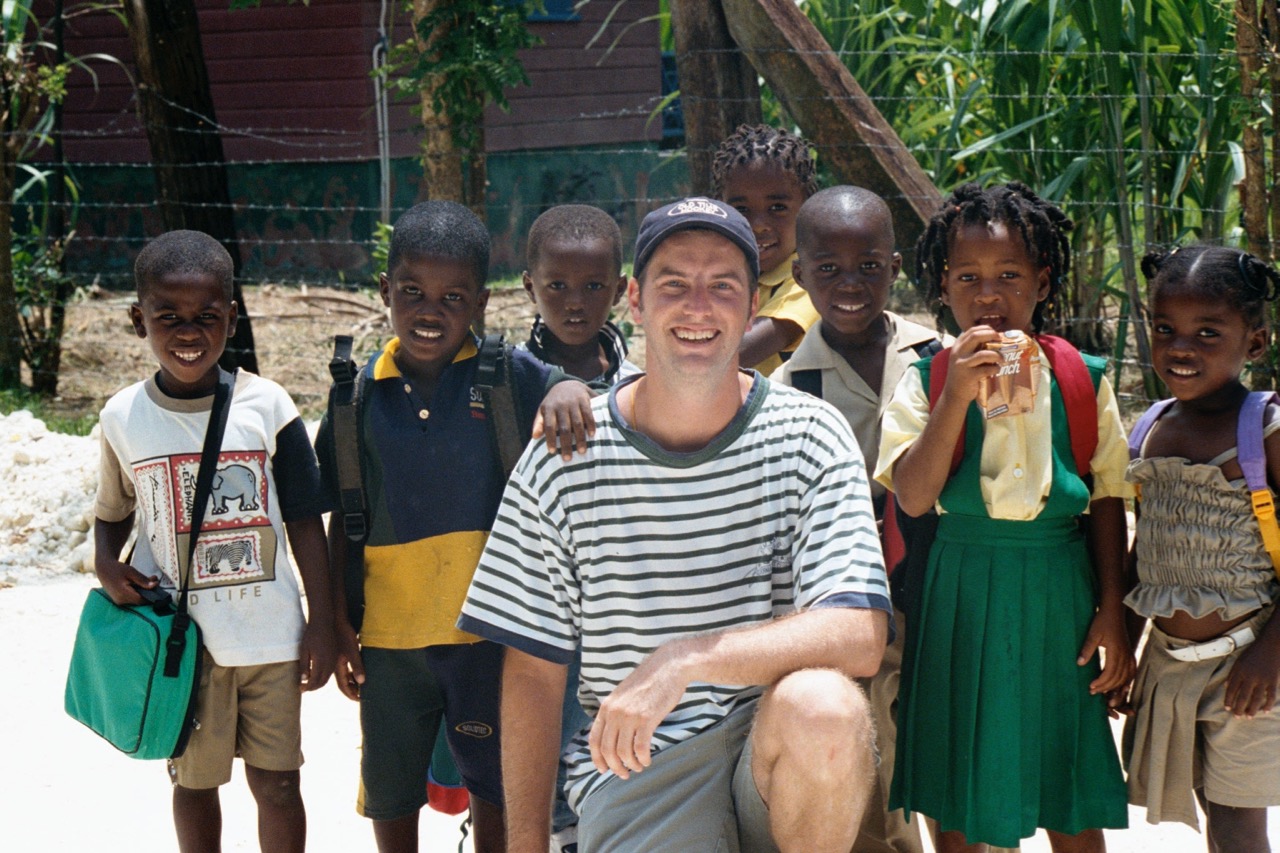 Landie took my photo with the kids. Who is that young guy???