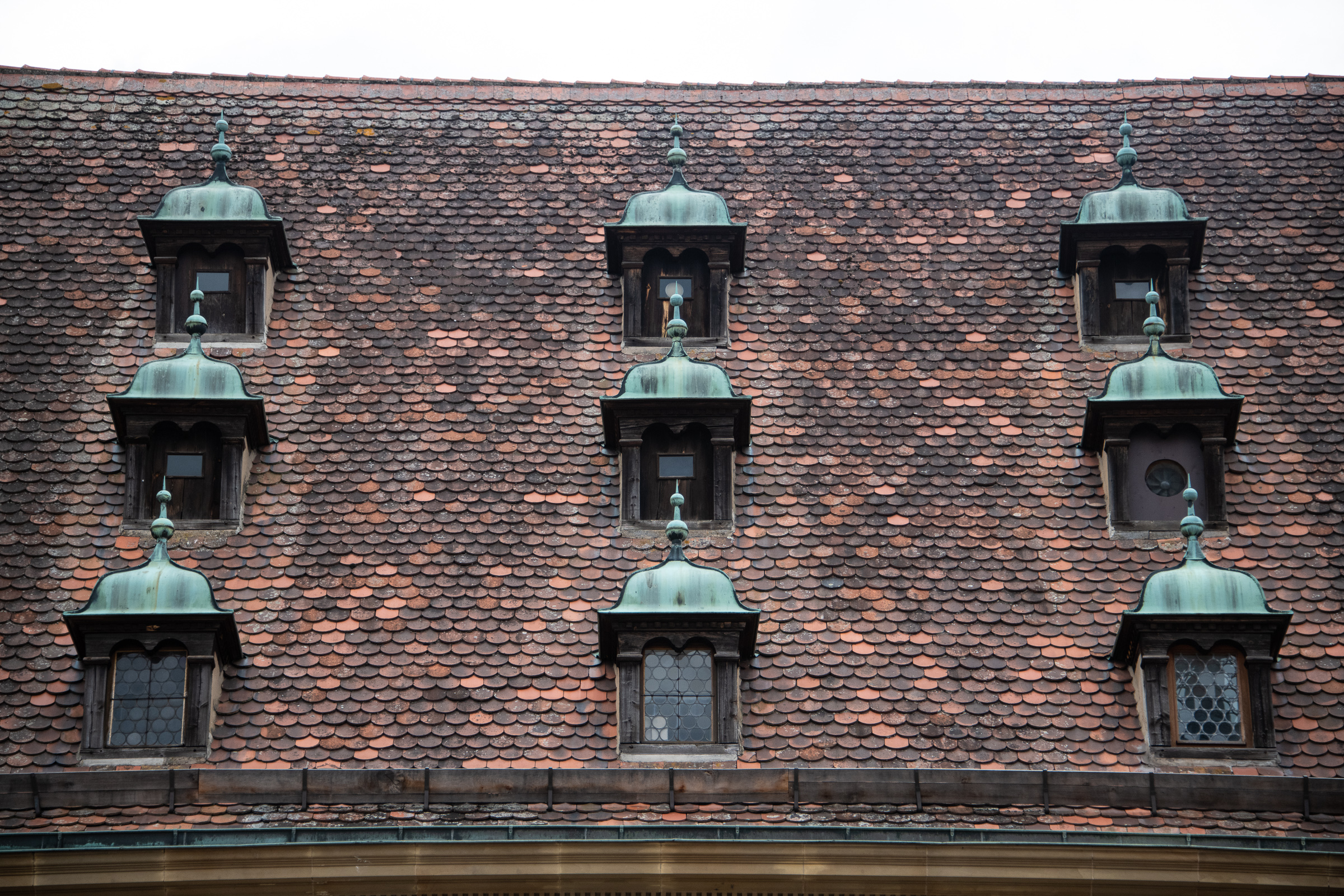 I love how so many buildings have cool dormers like this.