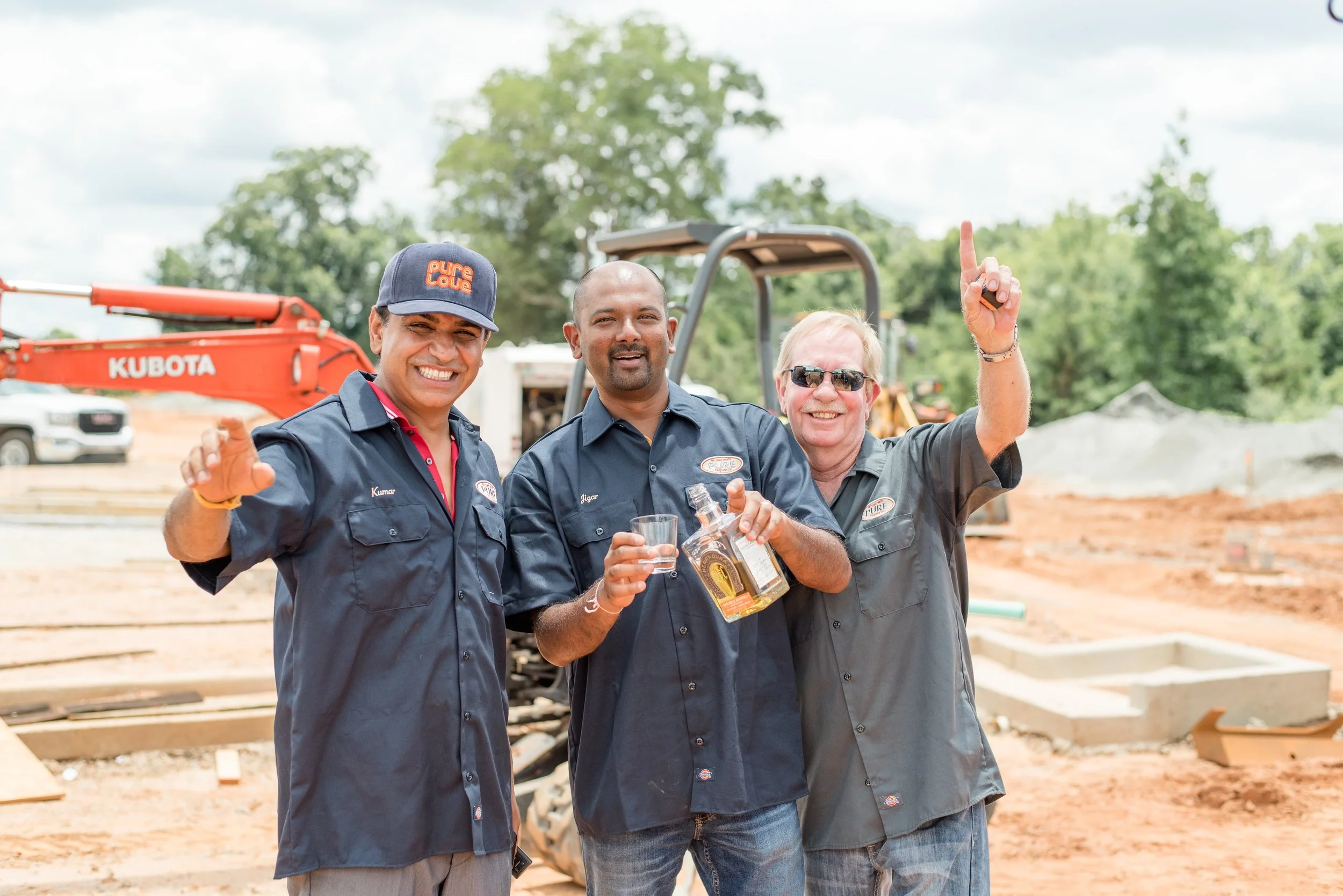 Pictured : Franchisees Suresh Kumar (left) , Jigar Shah (middle), and manager Dennis Butterfield (right)