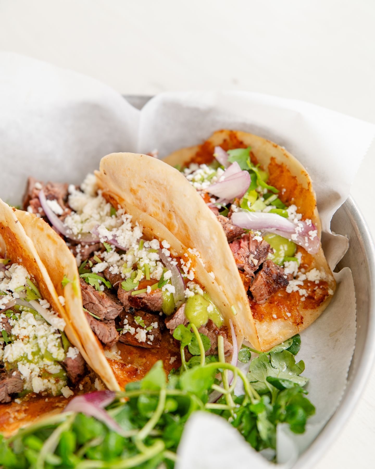 TGITT -- Thank God It's Taco Tuesday! 🌮

Consider this your sign to try our *NEW* Tacos Sonora! Made with all-natural steak, grilled fundido cheese, onion, cilantro, salsa aguacate, roasted chili de arbol, and watercress salad.