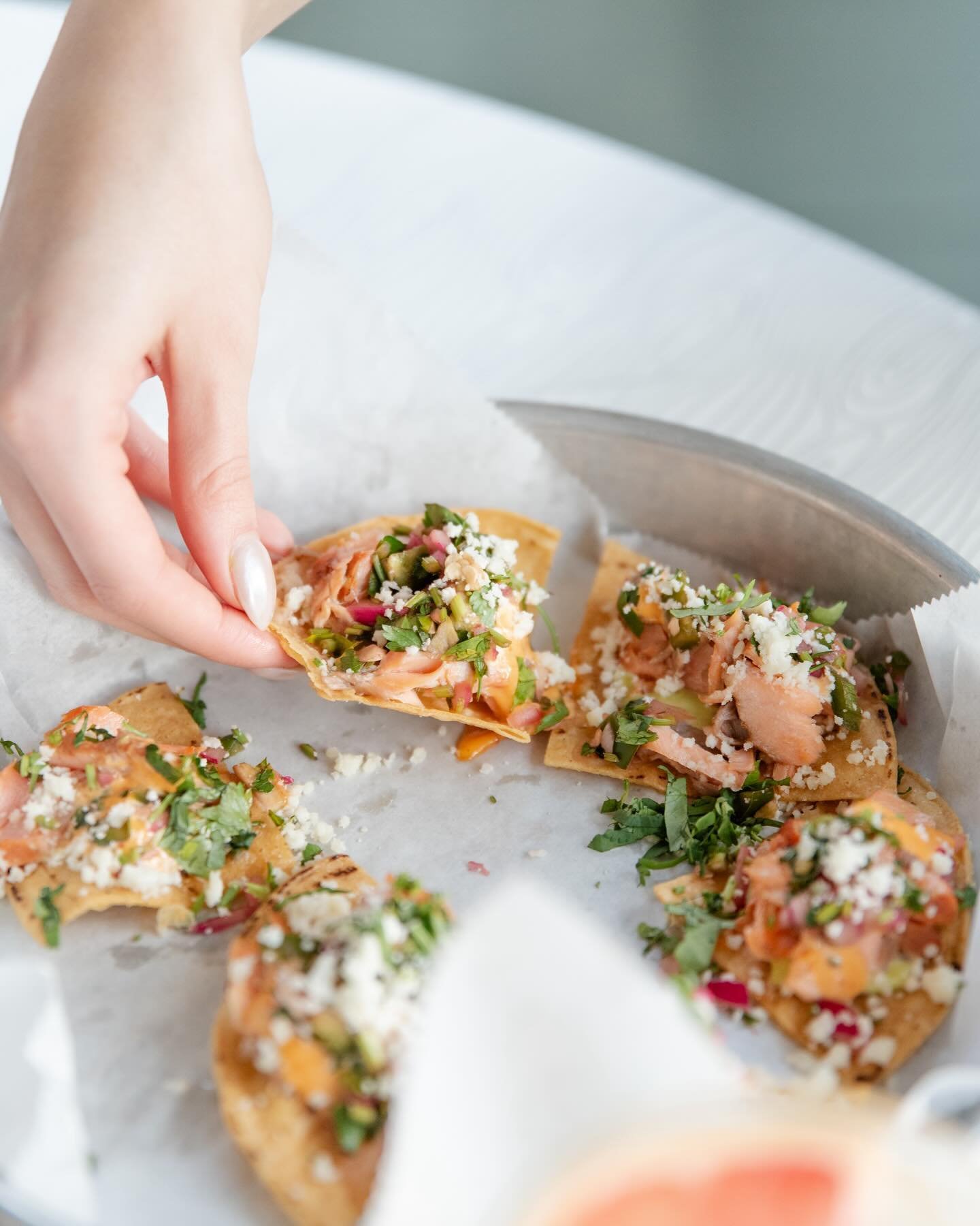 Starting off the week strong with our Totopos de Salm&oacute;n! House-smoked salmon, habanero-avocado mayo, chimichurri, chipotle mayo, &amp; queso fresco

Enjoy these at any of our pure locations.