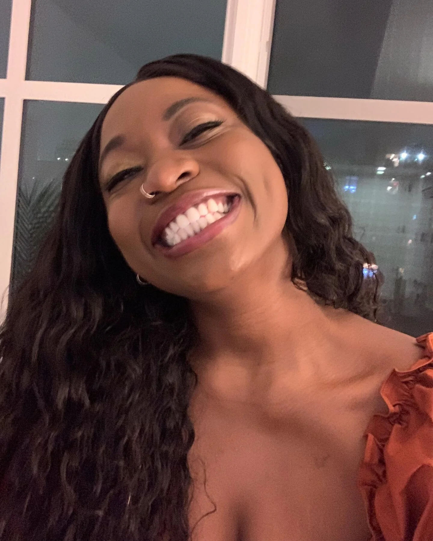 Walking into 2022 with a little more confidence, a lot less shame, and the same big ass head with a smile that match.

To more celebrations. More solitude. More community. More cries. More strides. More laughs. More life. 

Cheers! 🥂💕✨