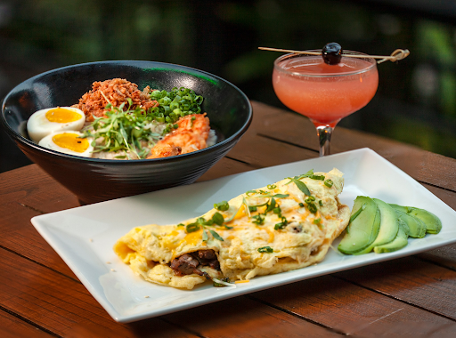 Chinese-American dishes including a noodle bowl, avocado-topped omelet, and signature cocktail served at The Formosa Cafe.