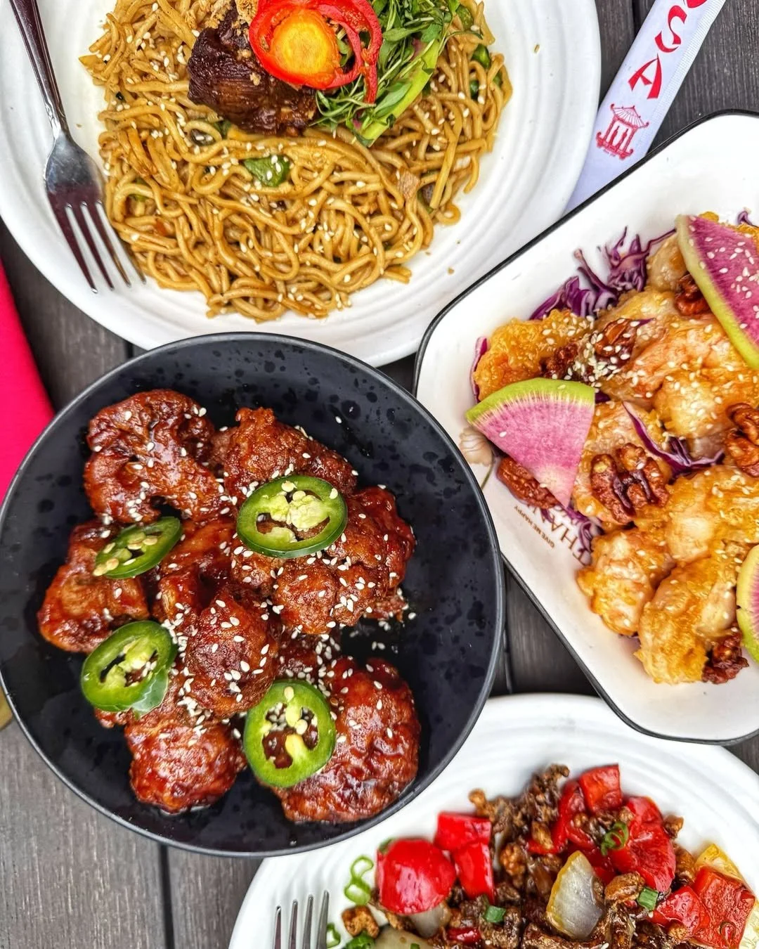 Chinese-American dishes including noodles, fried chicken, and stir-fry served family-style at The Formosa Cafe