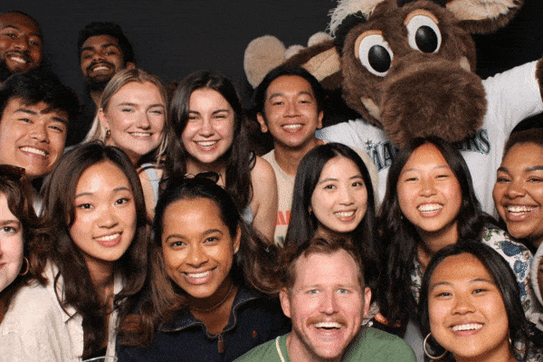 Animated GIF of a large group of fans and the Mariner Moose in a Fancy Booths photo booth at a Seattle Mariners event sponsored by Redfin at T-Mobile Park.