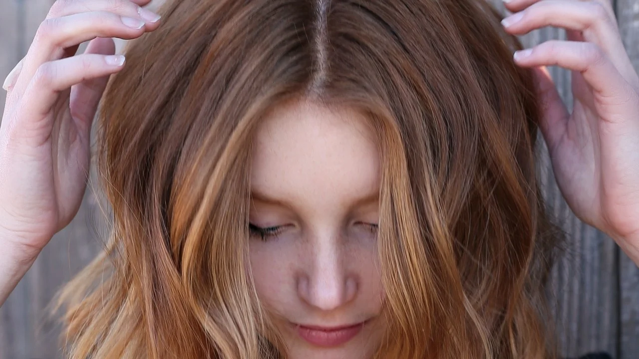  This "Warm Peach Cobbler" Hair Color Is the Freshest Way to Update Your Red Hair for Summer