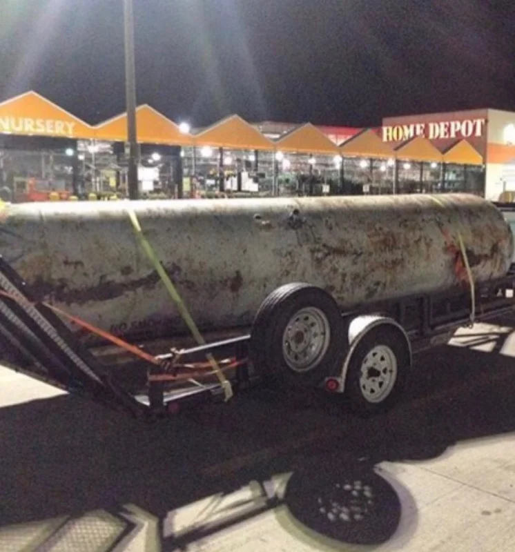 Pictured Above: 1000-gallon tank coming home